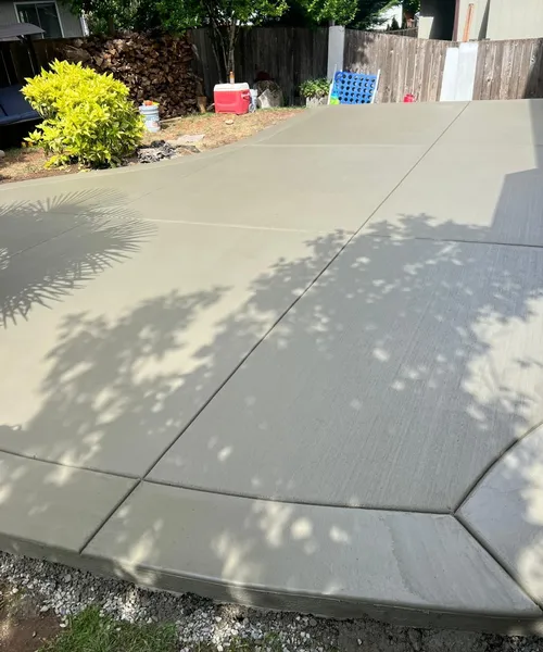 Broom finish patio and decorative borders in Covington 